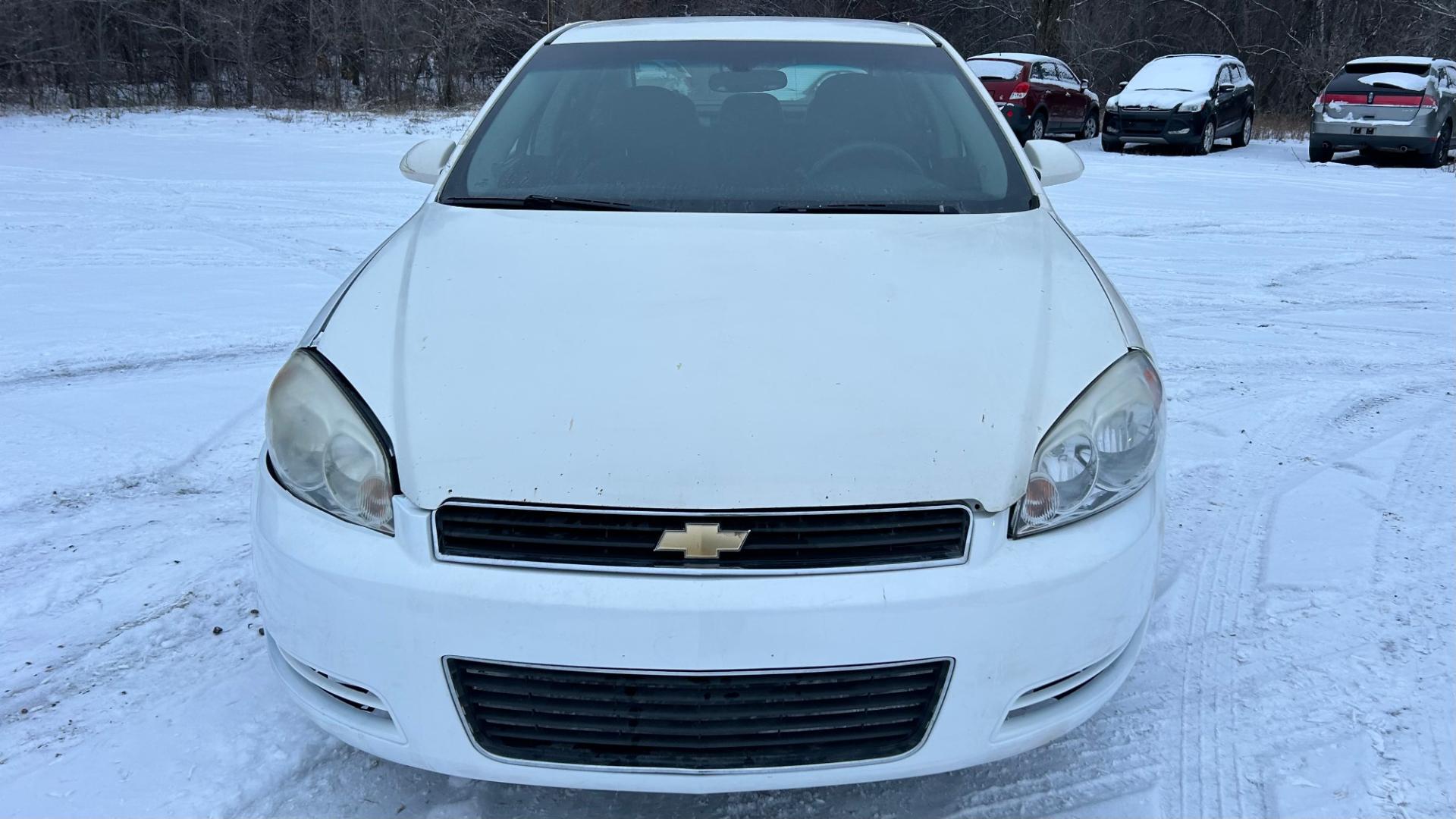 2009 White Chevrolet Impala LT (2G1WT57K791) with an 3.5L V6 OHV 12V FFV engine, 4-Speed Automatic Overdrive transmission, located at 17255 hwy 65 NE, Ham Lake, MN, 55304, 0.000000, 0.000000 - Photo#1